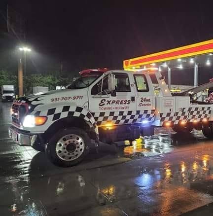Express Towing and Recovery truck at night